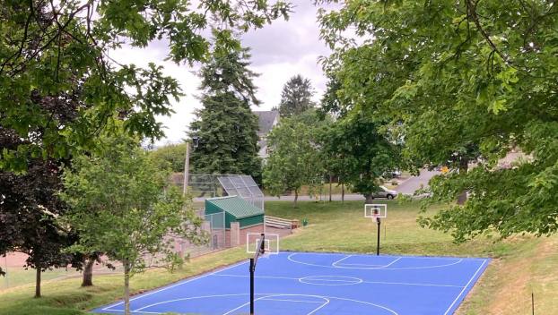 The new and improved basketball court at Tapiola Park gives community members another place to play basketball. Facebook